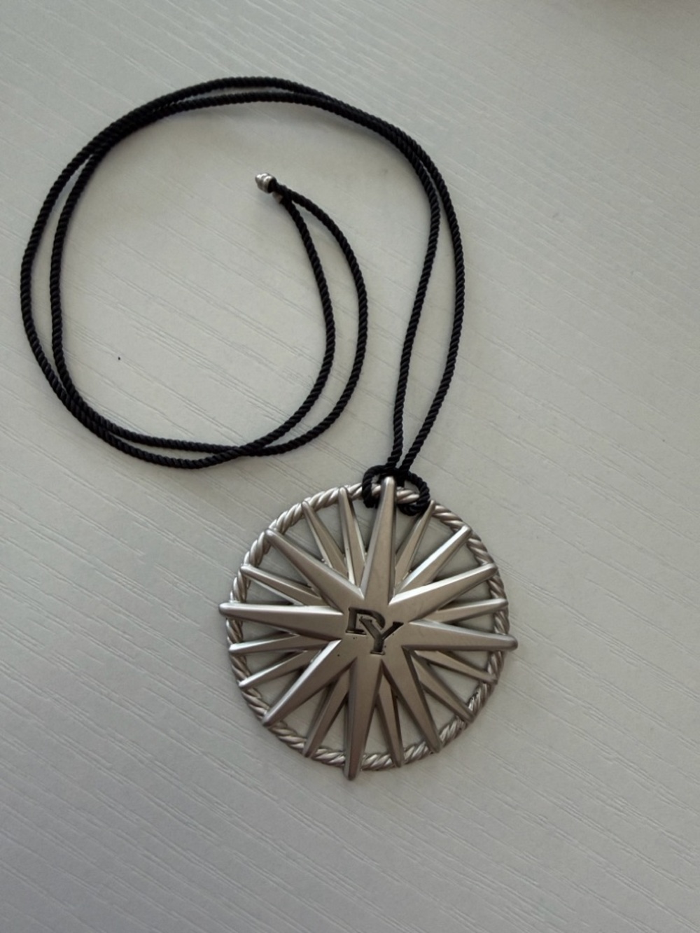 David Yurman Silver Starburst Pendant with Black Cord